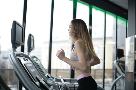 girl running on a treadmill